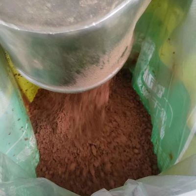 Spray-dried, high protein, low ash, low moisture fish feed additive